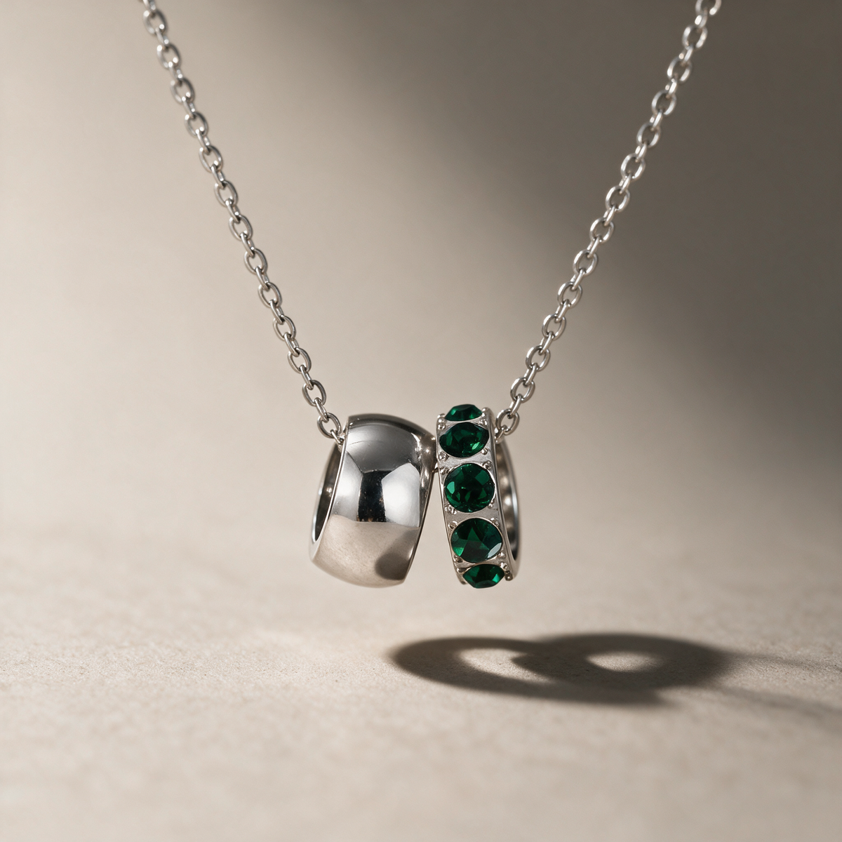The Linked Birthstone Necklace in green.