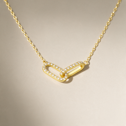The Linked Moments Necklace, on a plain ground.