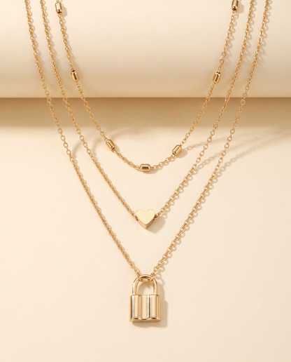 Layered Love Lock Necklace in gold, made in gold-plated copper.