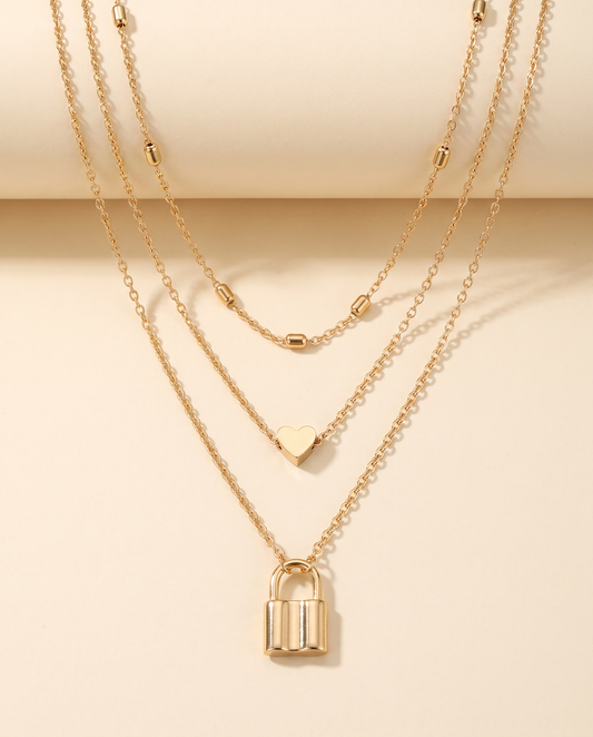 Layered Love Lock Necklace in gold, made in gold-plated copper.