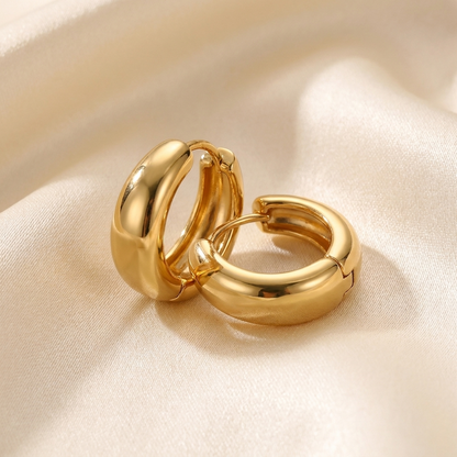 Wide Hoop Earrings — gold-plated copper, on a plain ground, view 2.