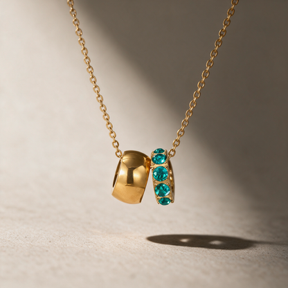 The Linked Birthstone Necklace in blue.