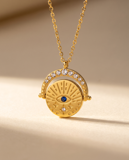 Oval Diamond Drop Necklace — stainless steel with 18K gold plating, on a plain ground.