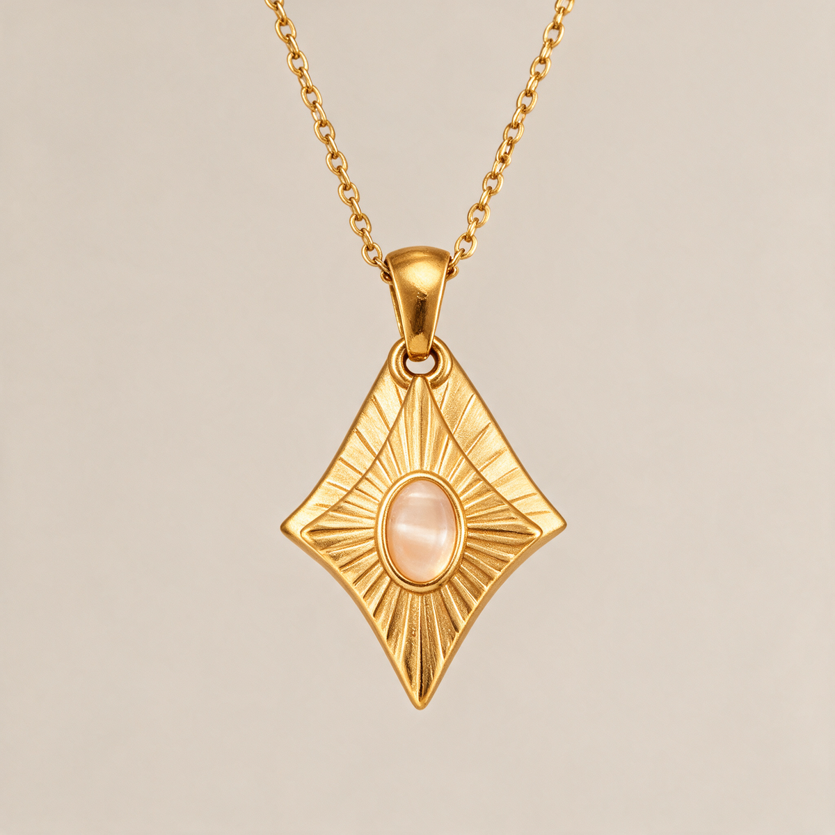 The Prism Heart Necklace in white, on a plain ground.