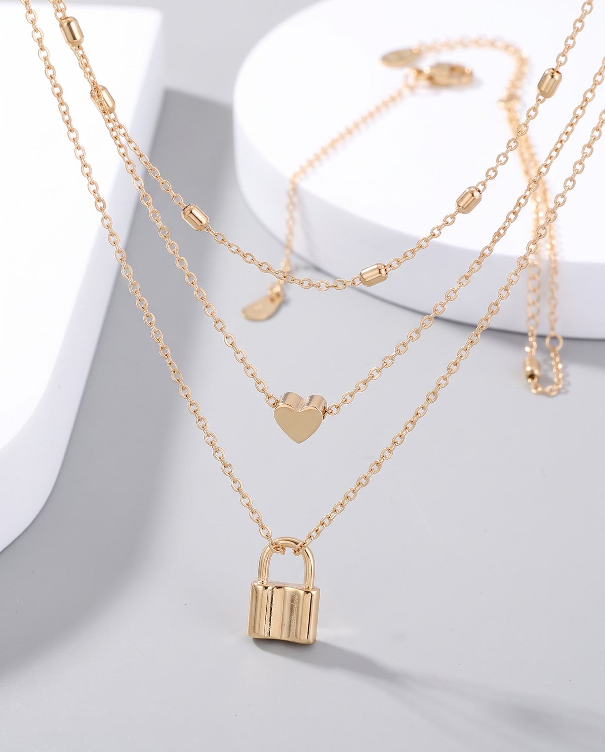 Layered Love Lock Necklace in gold, in gold-plated copper, view 4.