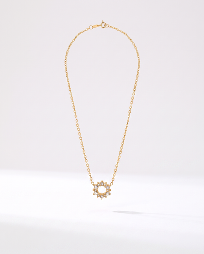 Geometric Ring Pendant Necklace in gold — a pendant on a chain in stainless steel with 18K gold plating.