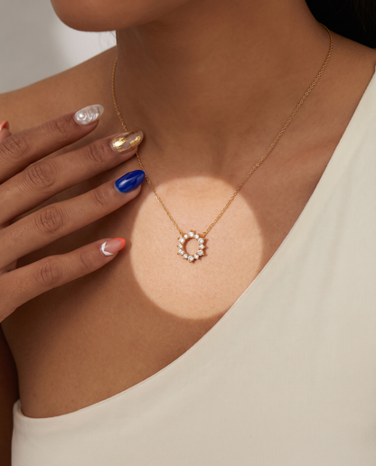 Geometric Ring Pendant Necklace in gold, worn, view 7.