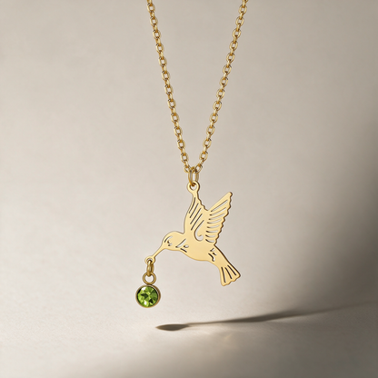 The Hummingbird Birthstone Necklace with the August birthstone.