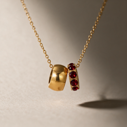 The Linked Birthstone Necklace in red.